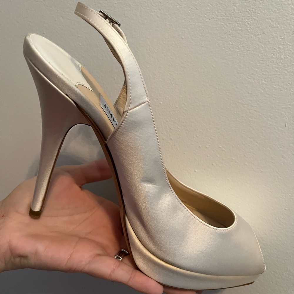 Ivory satin Jimmy Choo Clue peep toe sling back. Size 38.